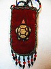 Dark red cell ph. holder w/ brown turtle